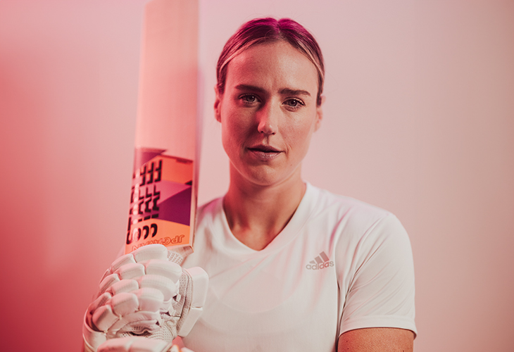 Ellyse Perry posing with Staple Cricket Bat.