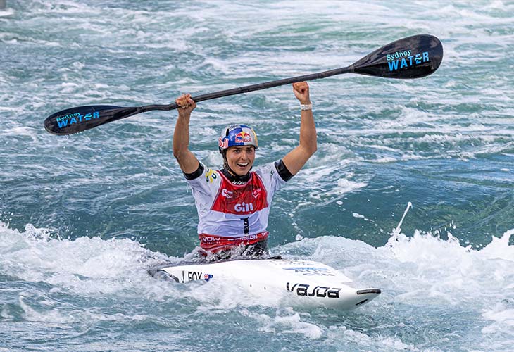 Jess Fox celebrating 10th world title win in the water.