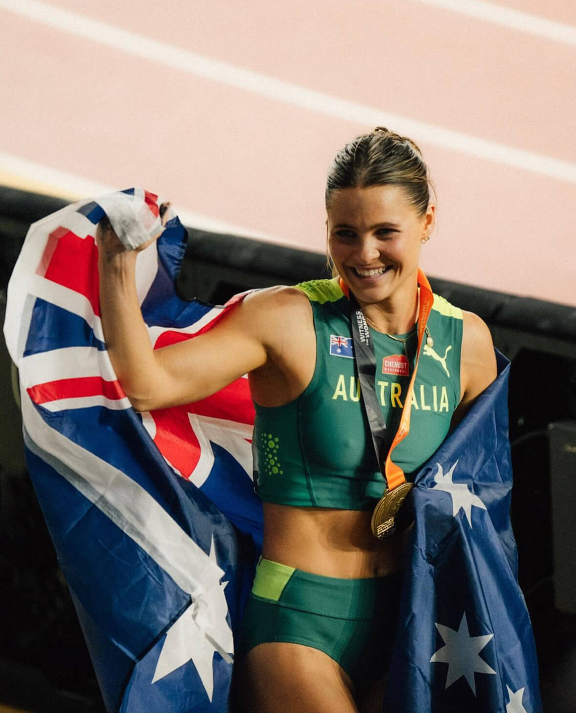 Nina Kennedy wearing the Australian flag as World Champion