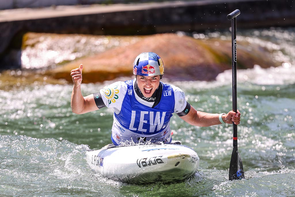 Jess Fox celebrating win in the water at Augsburg.